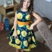 Платье для девочки нарядное БУШОН ST30, стиляги цвет зеленый/желтый, принт цветы