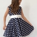Платье для девочки нарядное БУШОН ST10, стиляги цвет темно-синий, белый пояс, принт белый горошек